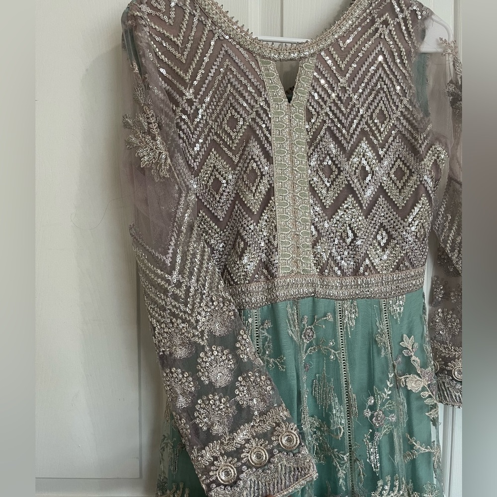 Never worn Baroque Desi Dress size XS. Lilac & Seafoam green